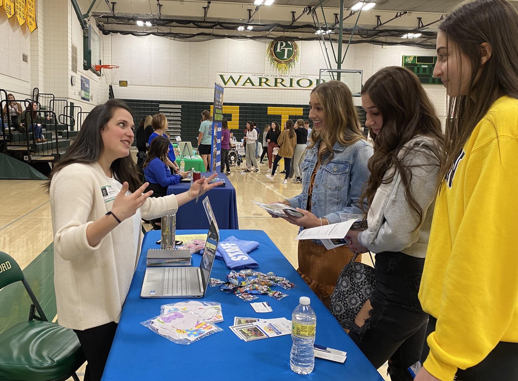 At the Hempfield Rec table, Alexa Rullo, Brianna Pusateri, and Lilly Palladino learn about becoming summer camp counselors