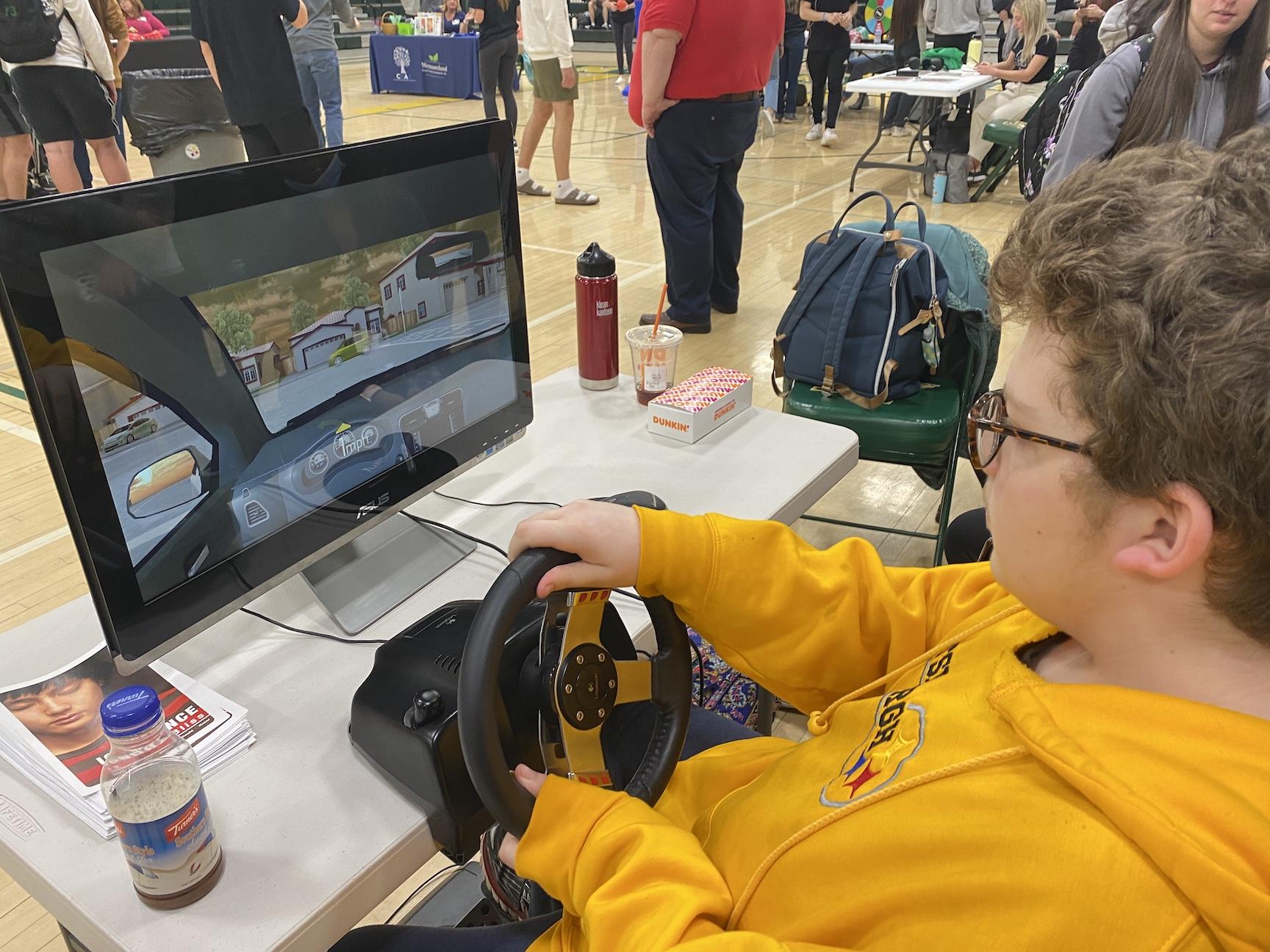 Zach Rebstock tries out the drunk driving simulator