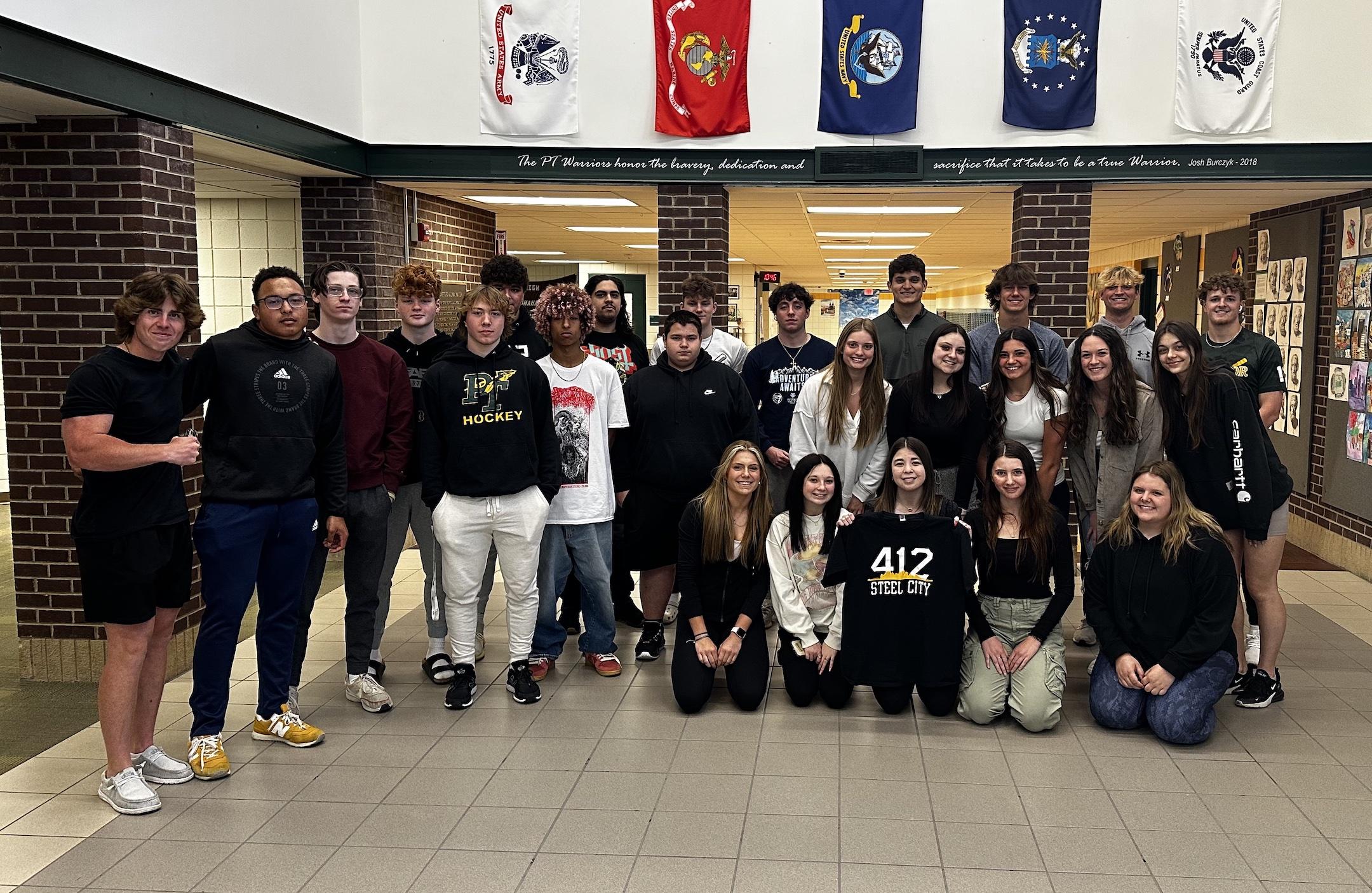 The 5th-period class designed and sold a ‘412’ shirt