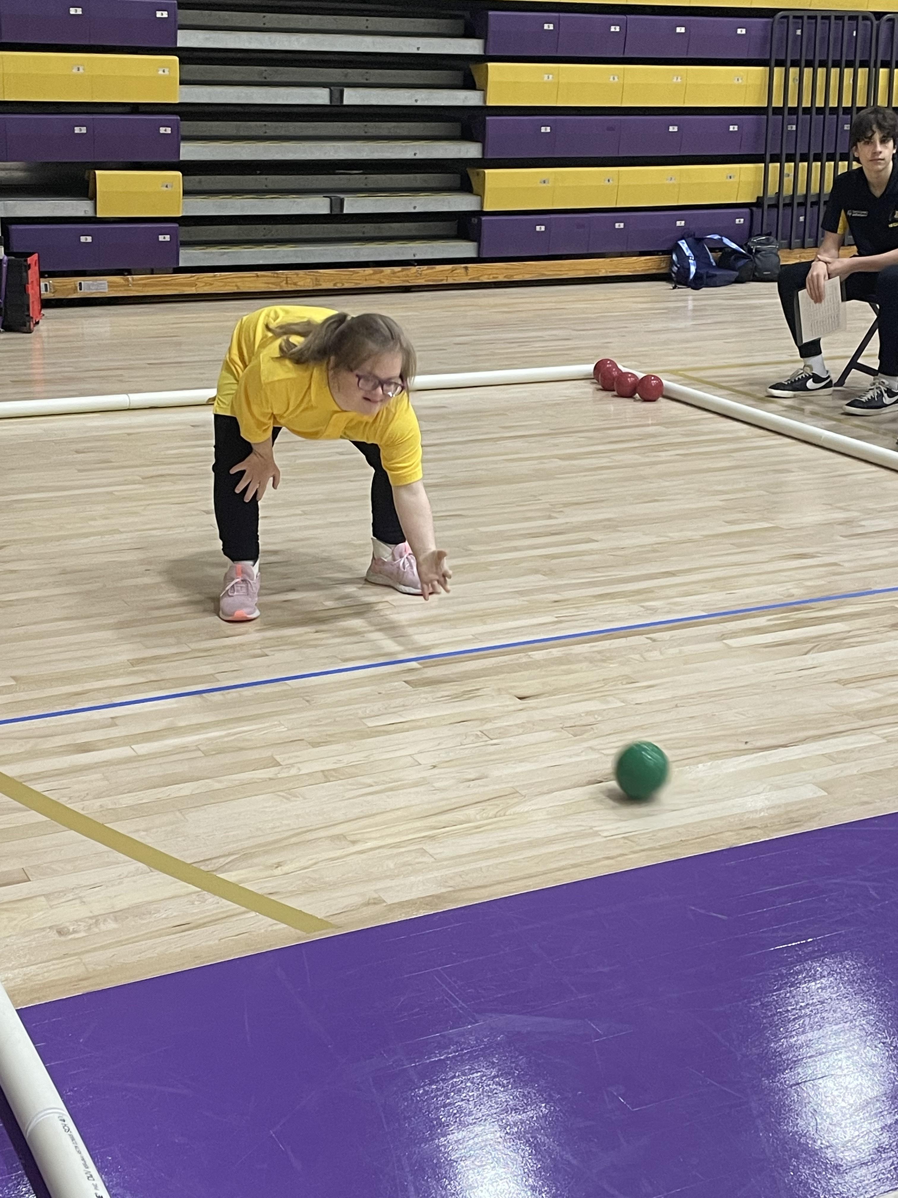 Jessica Paulone rolls a bocce ball during the competition